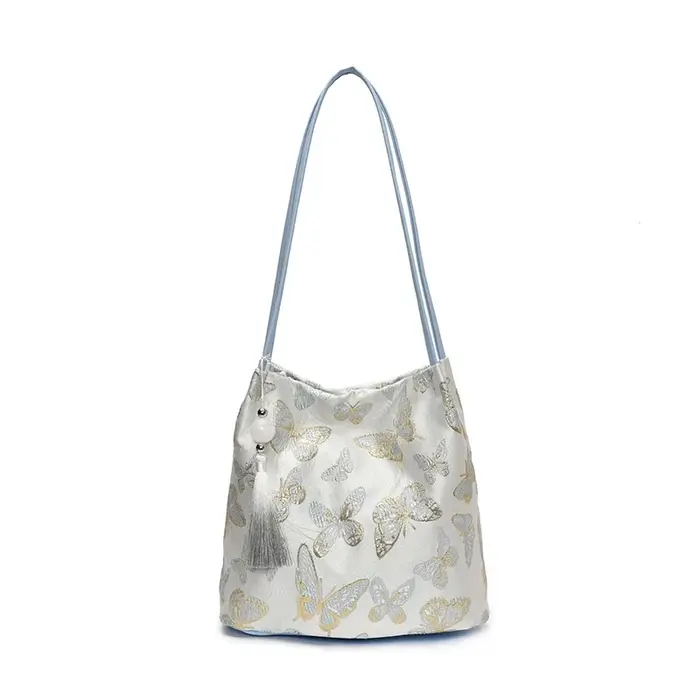 Sacs à bandoulière à loquet en soie de couleur unie