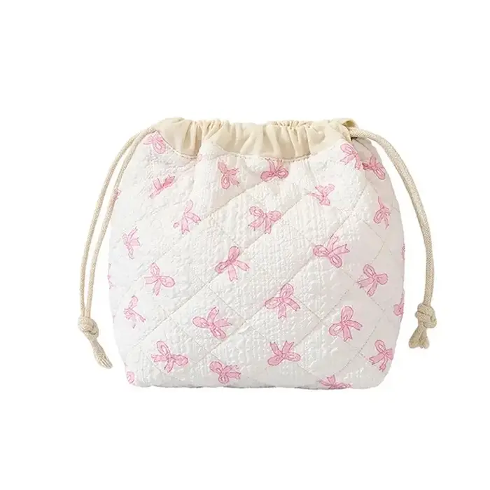 Jolie pochette à cordon pour cosmétiques avec motif nœud rose – Design matelassé durable pour femmes