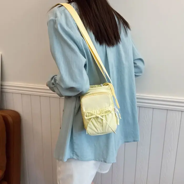 Sac à bandoulière pour bouteille d'eau à nœud papillon