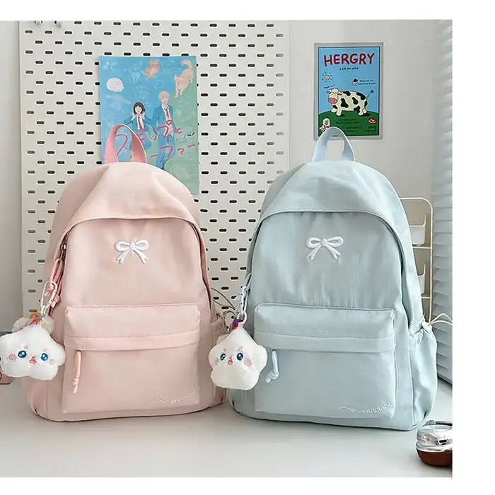 Nouveau sac à dos brodé élégant Style coréen japonais mignon sac d'école décontracté pour filles étudiants sac de voyage pour les déplacements quotidiens