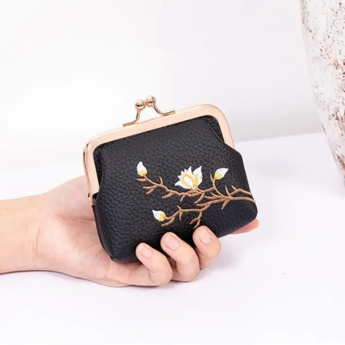 Pochette vintage à fermoir Kiss Lock