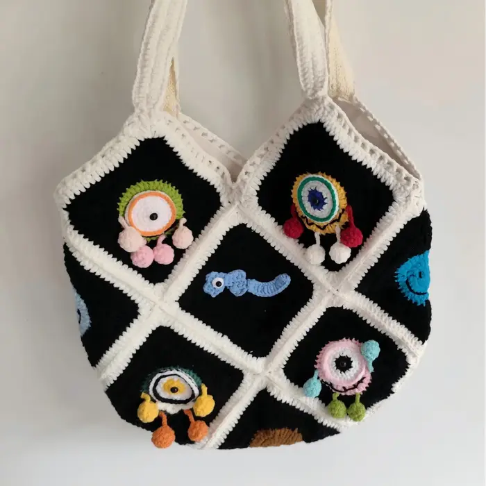 Sac à bandoulière en Crochet fait à la main avec fleur de monstre aux grands yeux