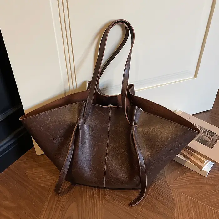 Sac fourre-tout rétro grande capacité, nouveau style 2026, sac de banlieue à bandoulière unique, sac de shopping populaire transfrontalier