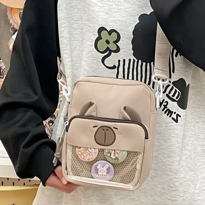 Sacs à bandoulière avec badge Capybara pour femme
