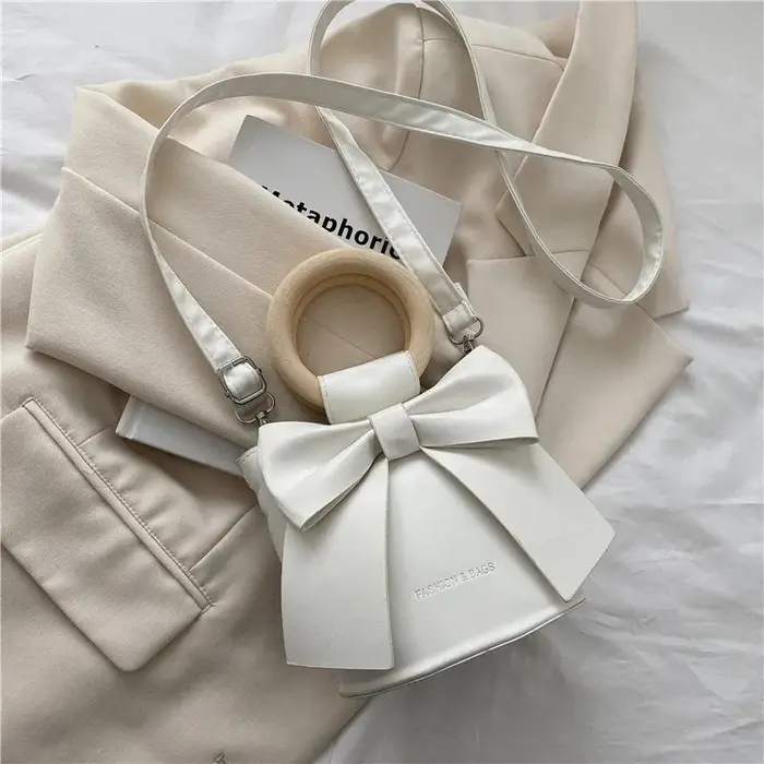 Mini sac à main rond en cuir PU pour femmes, avec poignée en bois et nœud papillon, porté croisé sur