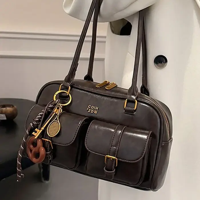 Sac à bandoulière rétro en cuir de couleur unie pour femmes
