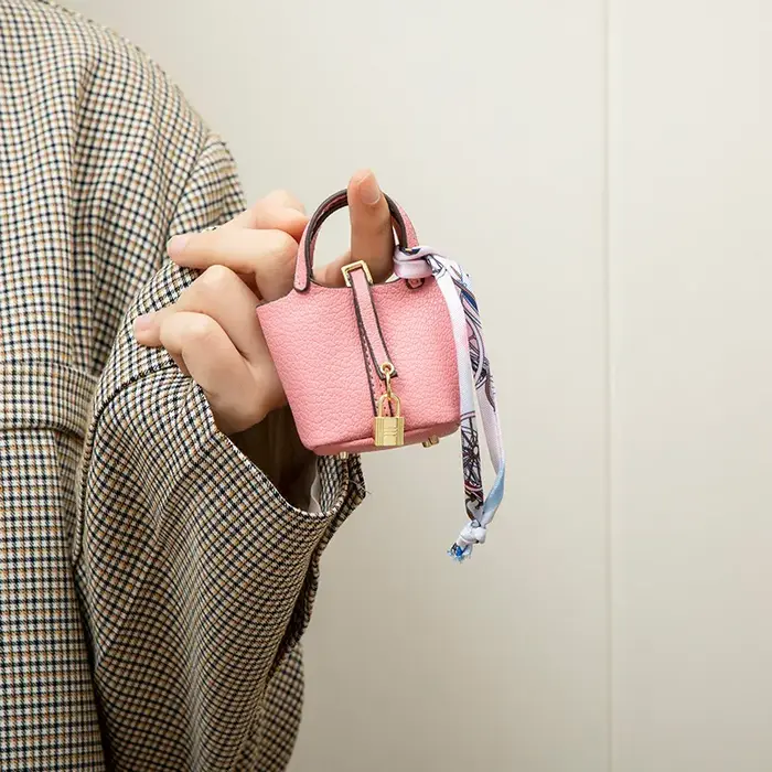 Nouveau Mini maison petit sac en cuir Portable main corde Bluetooth écouteur sac zéro portefeuille multi fonctionnel