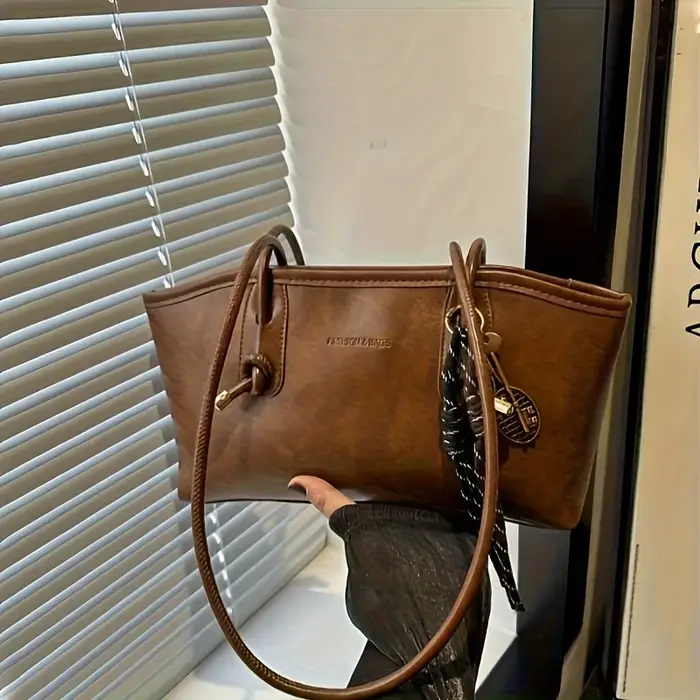 Sac à main chic en cuir souple