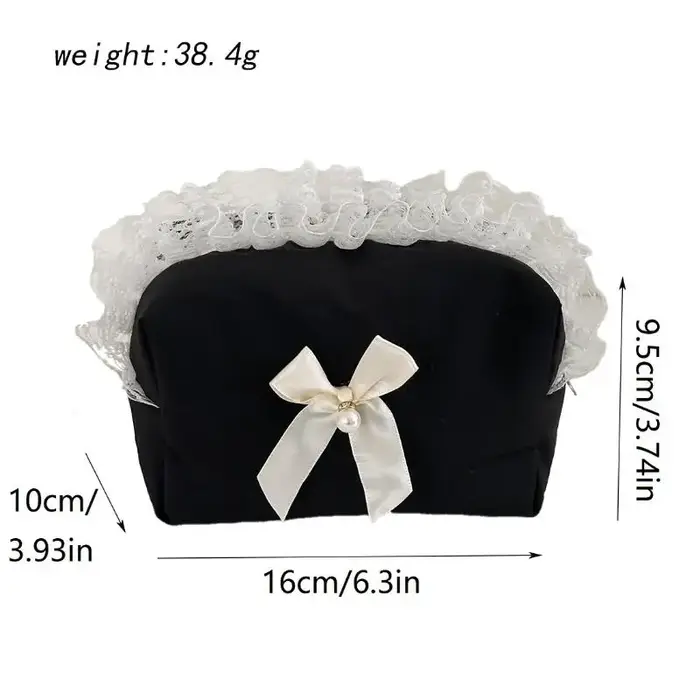 Trousse de maquillage noire en dentelle avec nœud