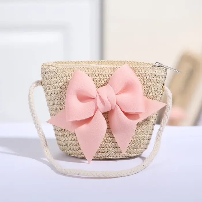Sac à bandoulière rose avec nœud papillon pour fille