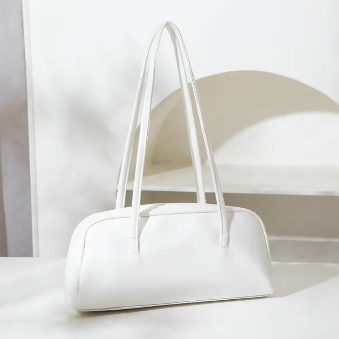 Petit sac à une épaule de couleur unie de style français