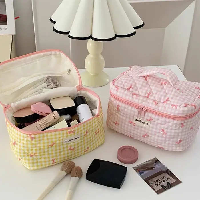 Nouveau dessin animé nœud papillon fourre-tout maquillage sac à fermeture éclair femmes grande capacité Quilting pochette sac de toilette mignon Portable sac de rangement cosmétique
