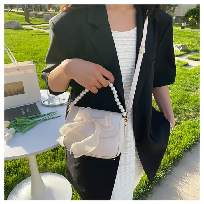 Sac à main en toile avec nœud papillon pour femme