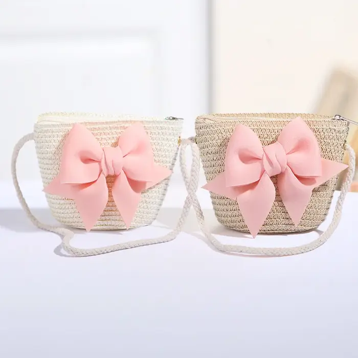 Sac à bandoulière rose avec nœud papillon pour fille