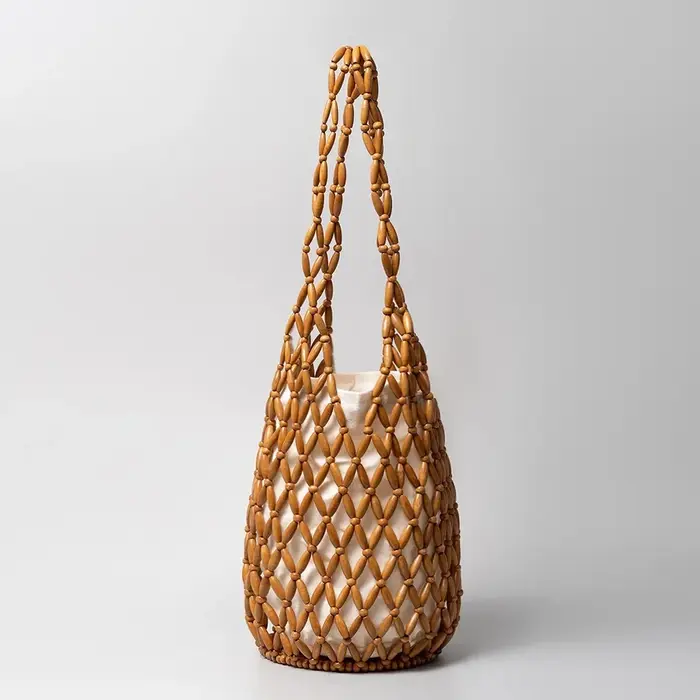 Sac tissé Design exquis évider perle de bois fourre-tout seau sac à bandoulière femme été plage sac à main сумка mягкая ♥