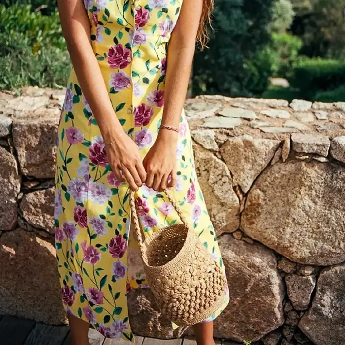 Sac à bandoulière bohème en raphia tressé à motif floral ajouré