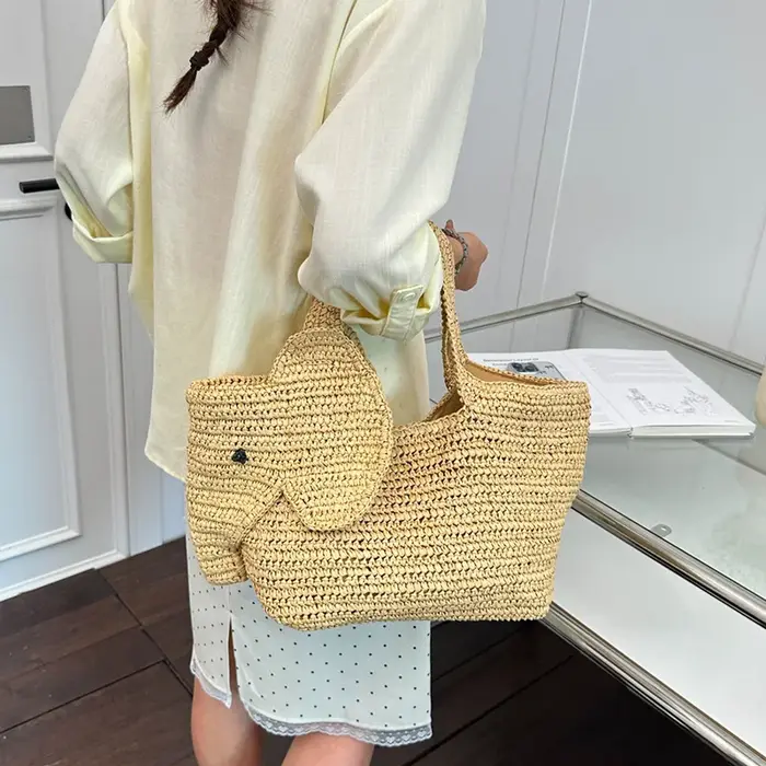 Sac à main en raphia tressé à la main en forme d'éléphant