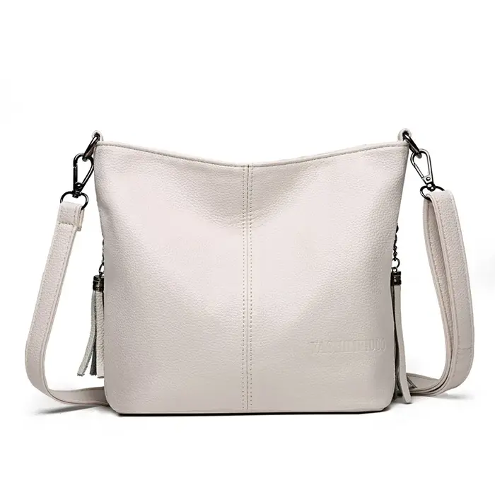 Sac à main en cuir avec pompon pour femme