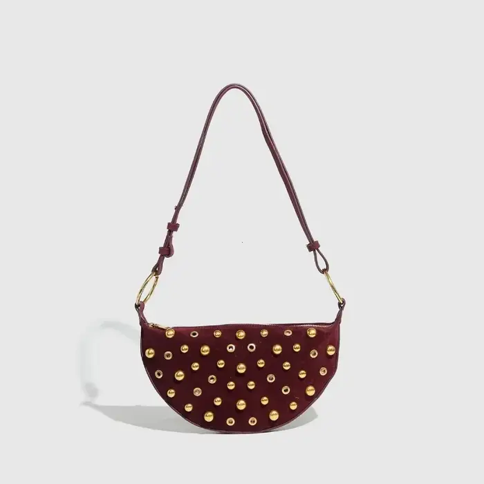 Sac à bandoulière clouté de styliste