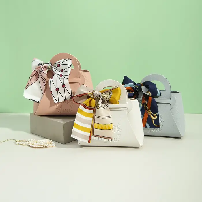 Mini sacs cadeaux de pâques en cuir avec ruban à nœud