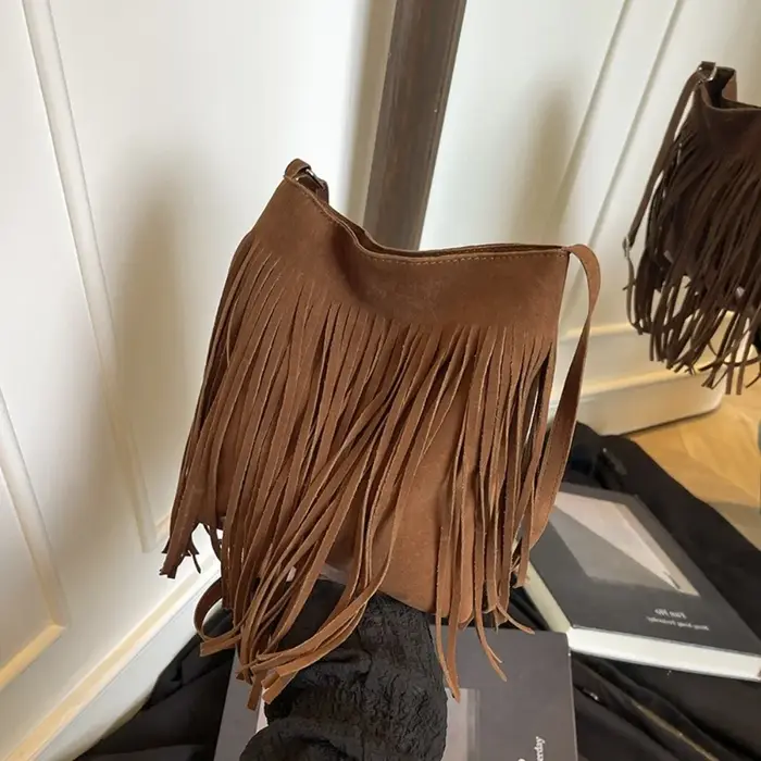 Sac bandoulière vintage en suède à franges