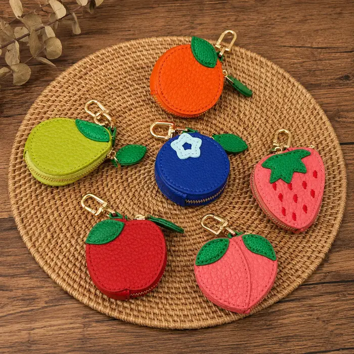 1 pièce Porte-monnaie en cuir PU motif dessin animé, pochette en forme de fruit (pêche, pomme), breloque de sac multifonctionnelle pour clé de voiture et pièces de monnaie