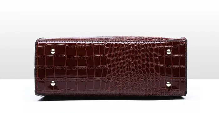 Sac à main en cuir verni pour femme