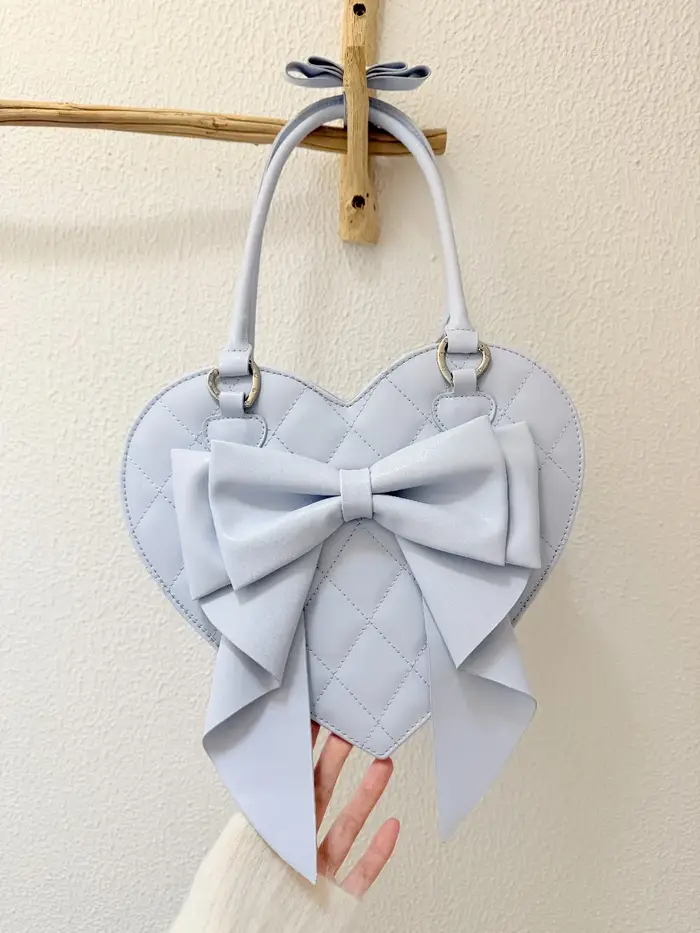 Sacs à main originaux en forme de cœur avec nœud
