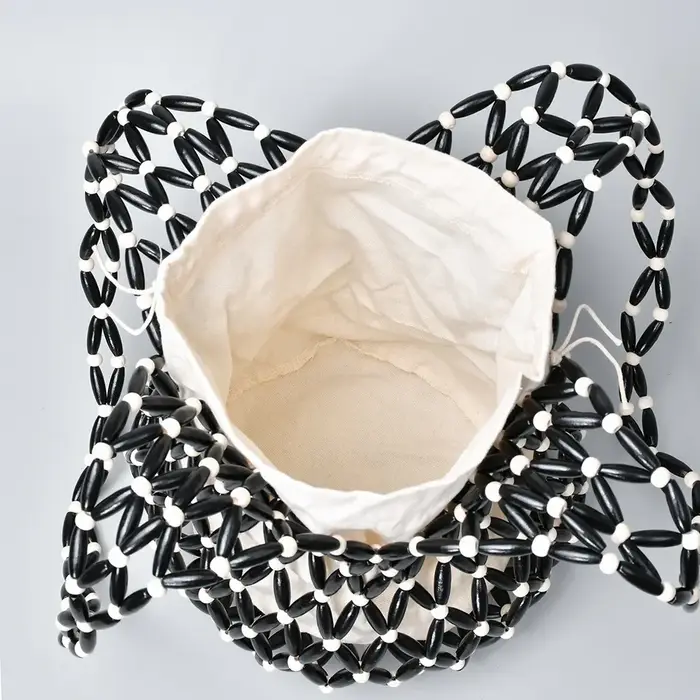 Sac tissé Design exquis évider perle de bois fourre-tout seau sac à bandoulière femme été plage sac à main сумка mягкая ♥