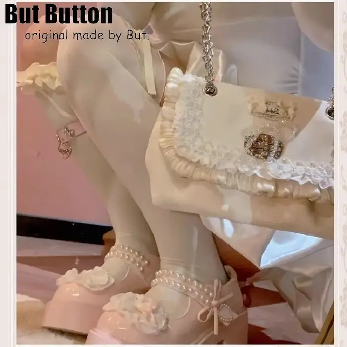 Lolita – sac à main élégant avec nœud en dentelle satinée