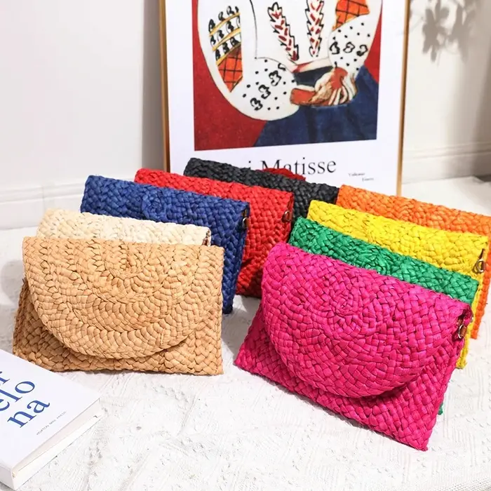 Femmes mode rabat enveloppe sacs été sac de plage portefeuille fait à la main paille tricoté sac