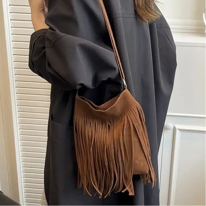 Sac bandoulière vintage en suède à franges