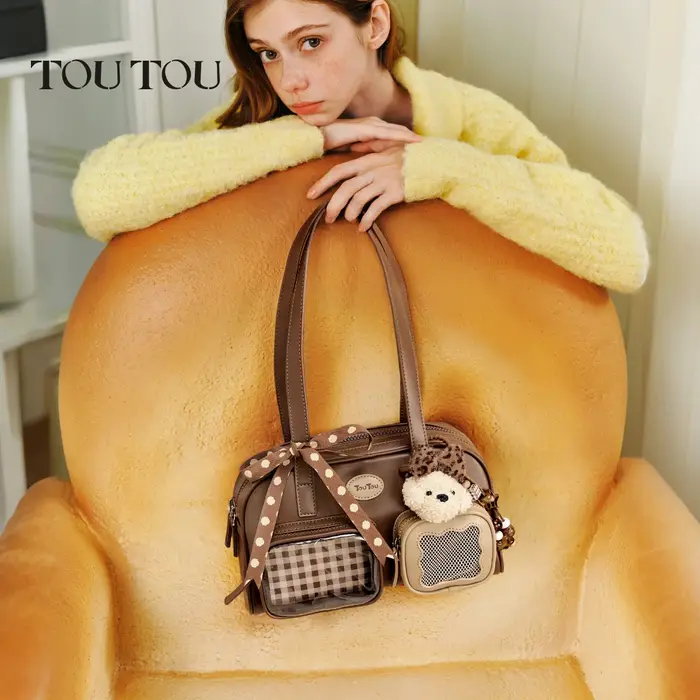 Sac à main de luxe en cuir Toutou multi-poches pour femme