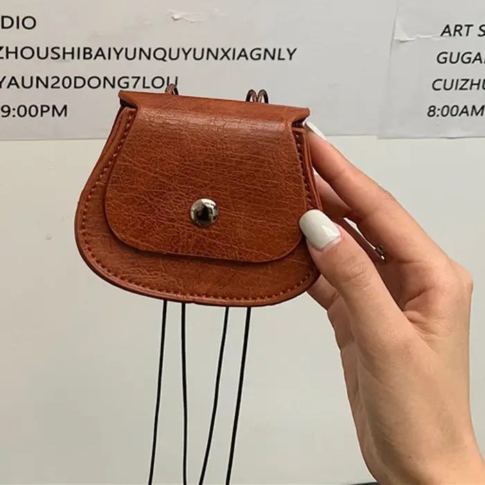 Mini sac à bandoulière en cuir pour femme