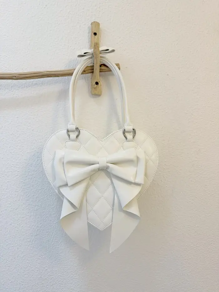 Sacs à main originaux en forme de cœur avec nœud