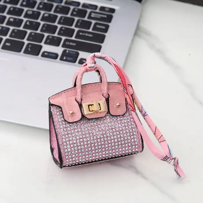 Mini sac décoratif suspendu motif peau de serpent