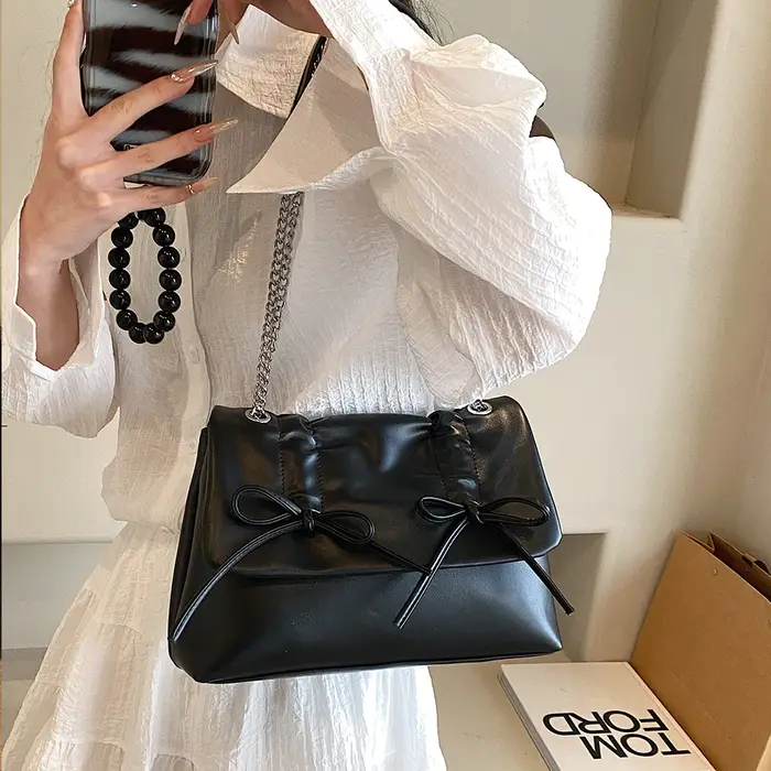 Sac à bandoulière tendance en cuir PU avec chaîne
