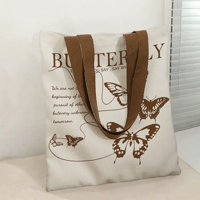 Sac fourre-tout vintage marron avec imprimé papillon et citation