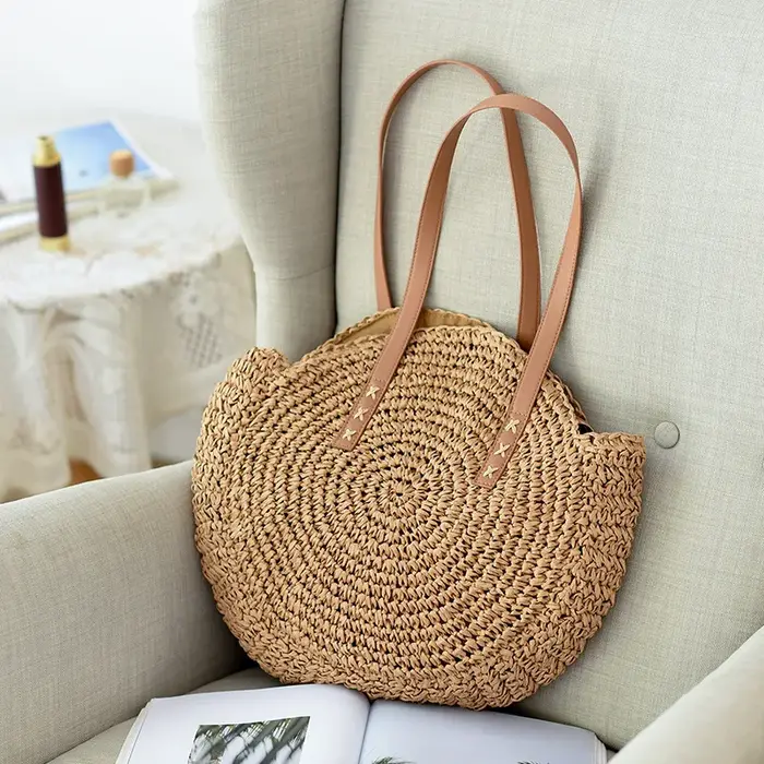 Sac à bandoulière rond en paille d'été pour femmes