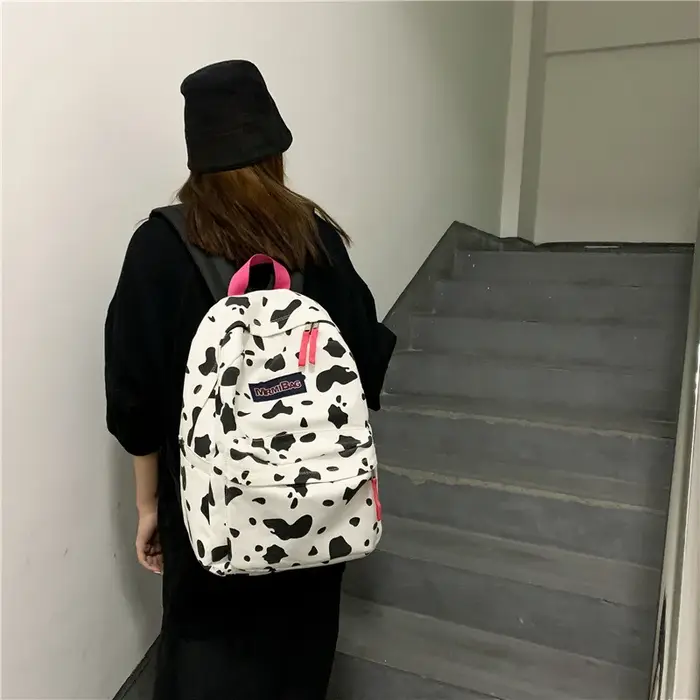 Sac à dos décontracté en toile à imprimé léopard pour femme