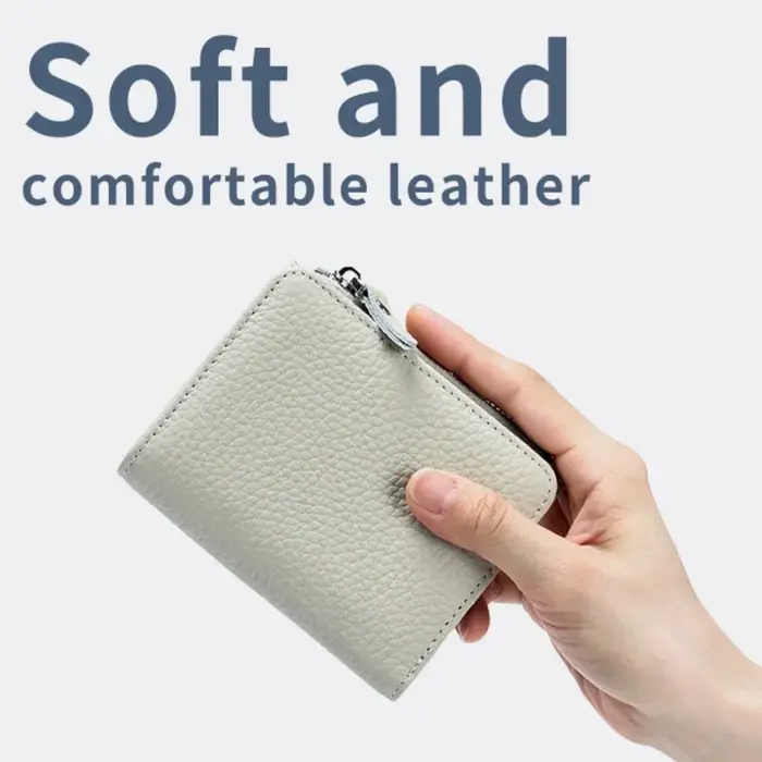 Poudres d'écouteurs en cuir véritable pour hommes et femmes, portefeuilles courts RFID, porte-cartes, sac portable en cuir de vachette, petite fermeture éclair, porte-monnaie
