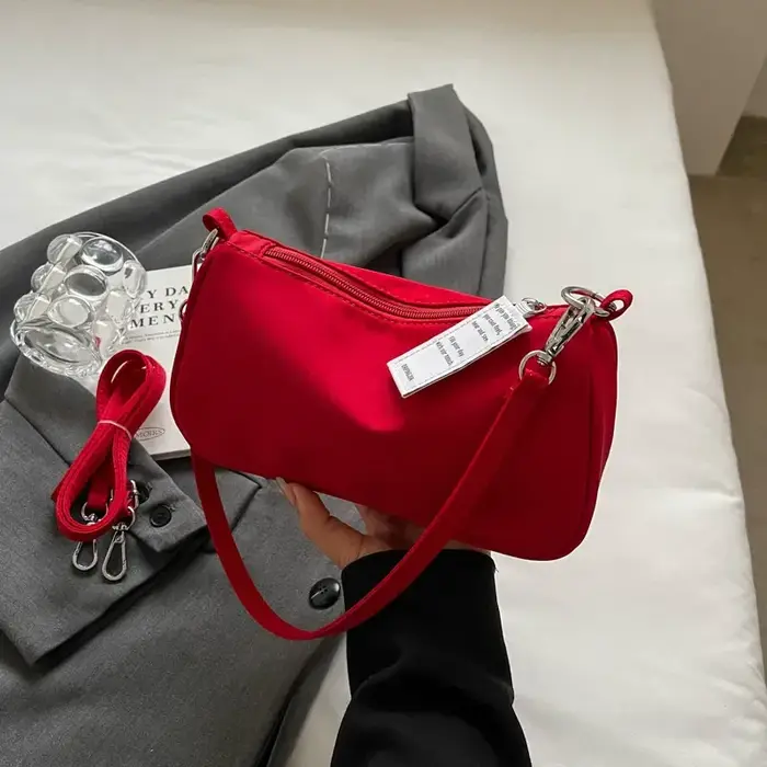 Sac à bandoulière rouge pour femmes, nouveau sac à main haut de gamme Sensation sous les bras Simple