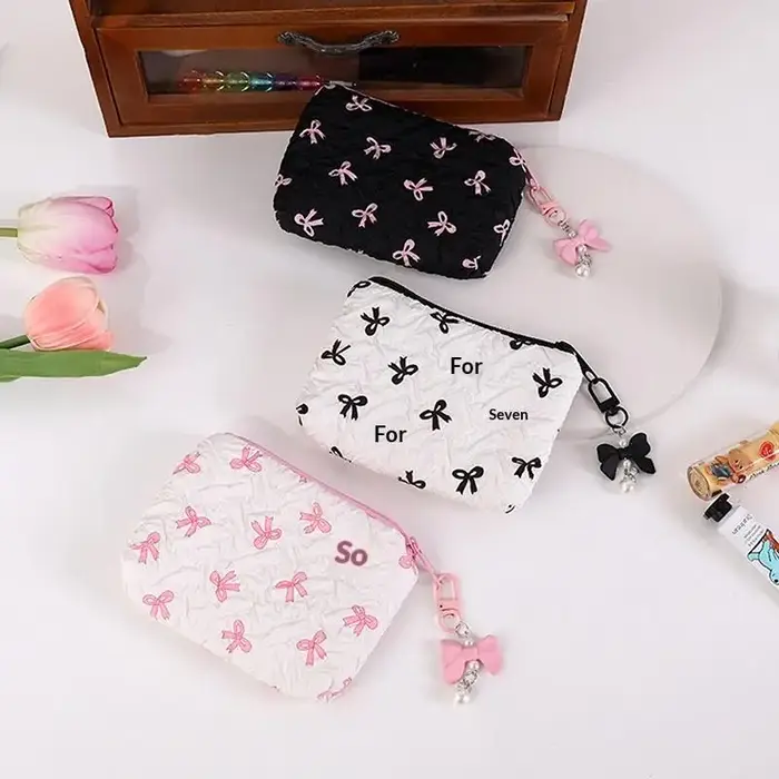 Trousse de maquillage en tissu avec nœud mignon