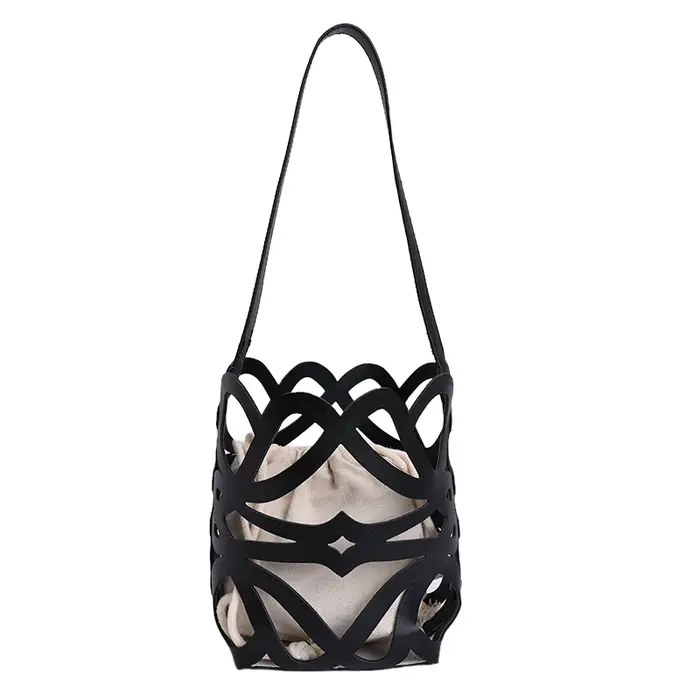 Sac de plage d'été 2026 en osier ajouré, design avancé, sac seau tissé à bandoulière pour femme, sac