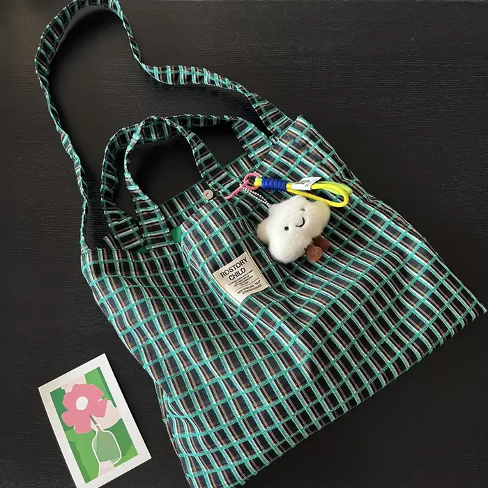 Sac en toile jacquard vert à carreaux color block