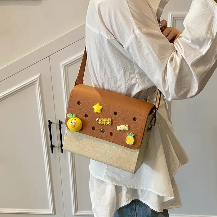 Sac messager léger et tendance en EVA perforé pour femme