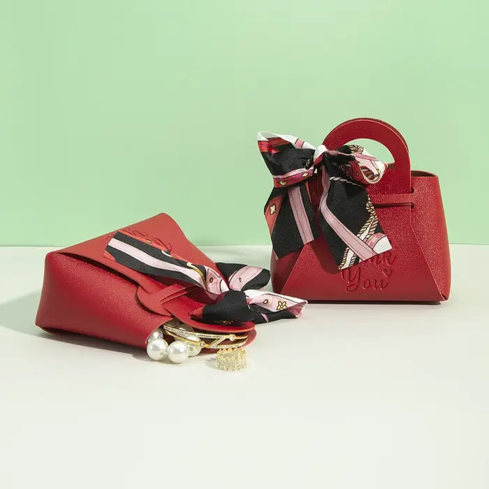 Mini sacs cadeaux de pâques en cuir avec ruban à nœud
