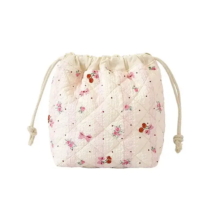 Jolie pochette à cordon pour cosmétiques avec motif nœud rose – Design matelassé durable pour femmes