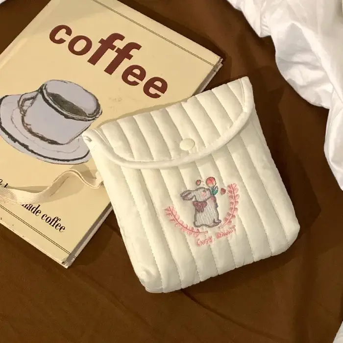 Sac de rangement portable mignon pour serviettes hygiéniques et tampons