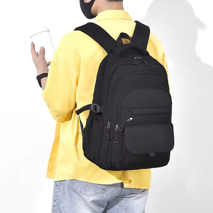 Un sac à dos multicouche imperméable et élégant Oxford grande capacité Simple banlieue hors sol étudiant sac à dos